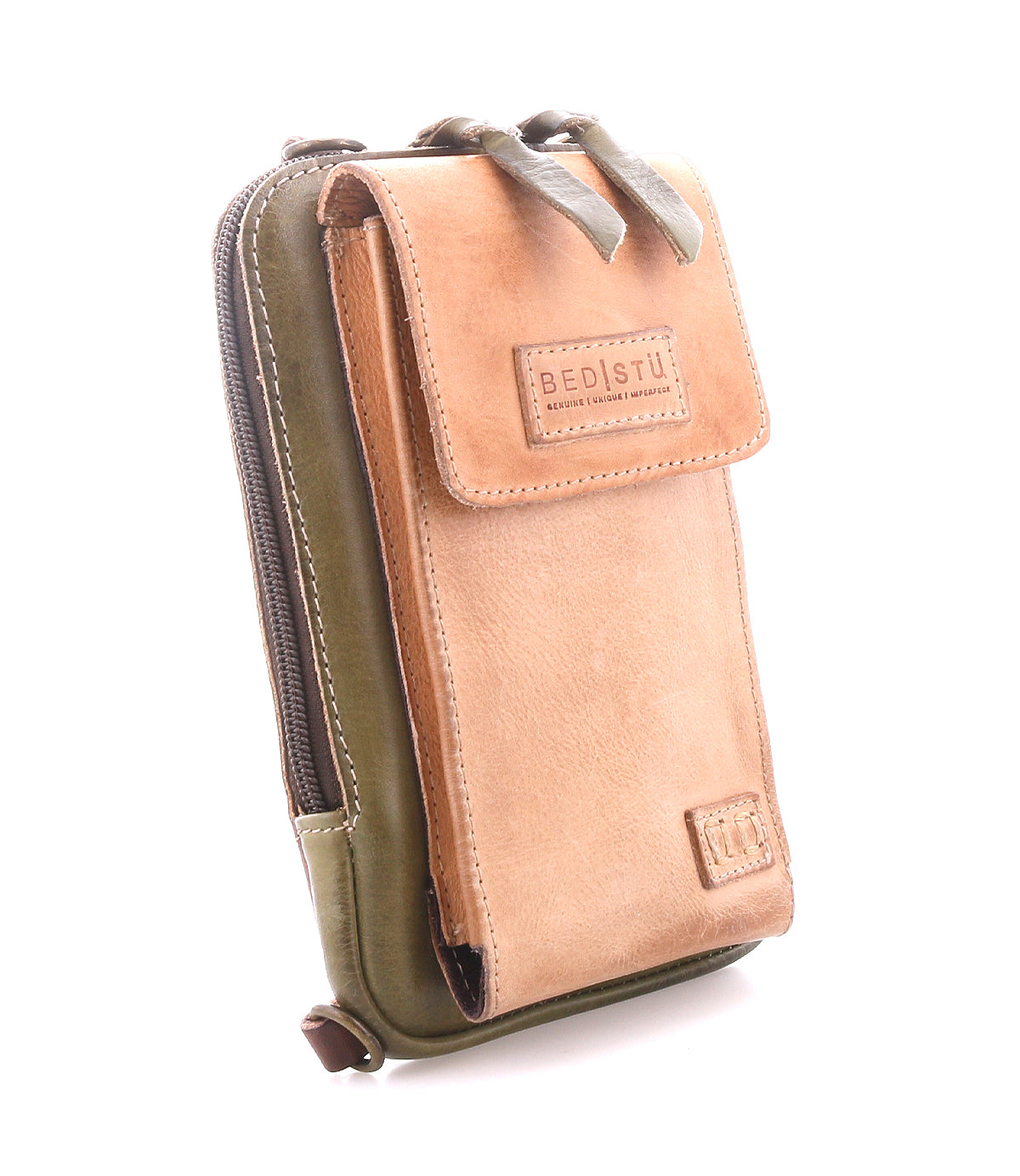 A stylish tan and green leather crossbody phone holder by Bed Stu, called Alelike, featuring a front flap, zipper pocket, and embossed brand name on the front.
