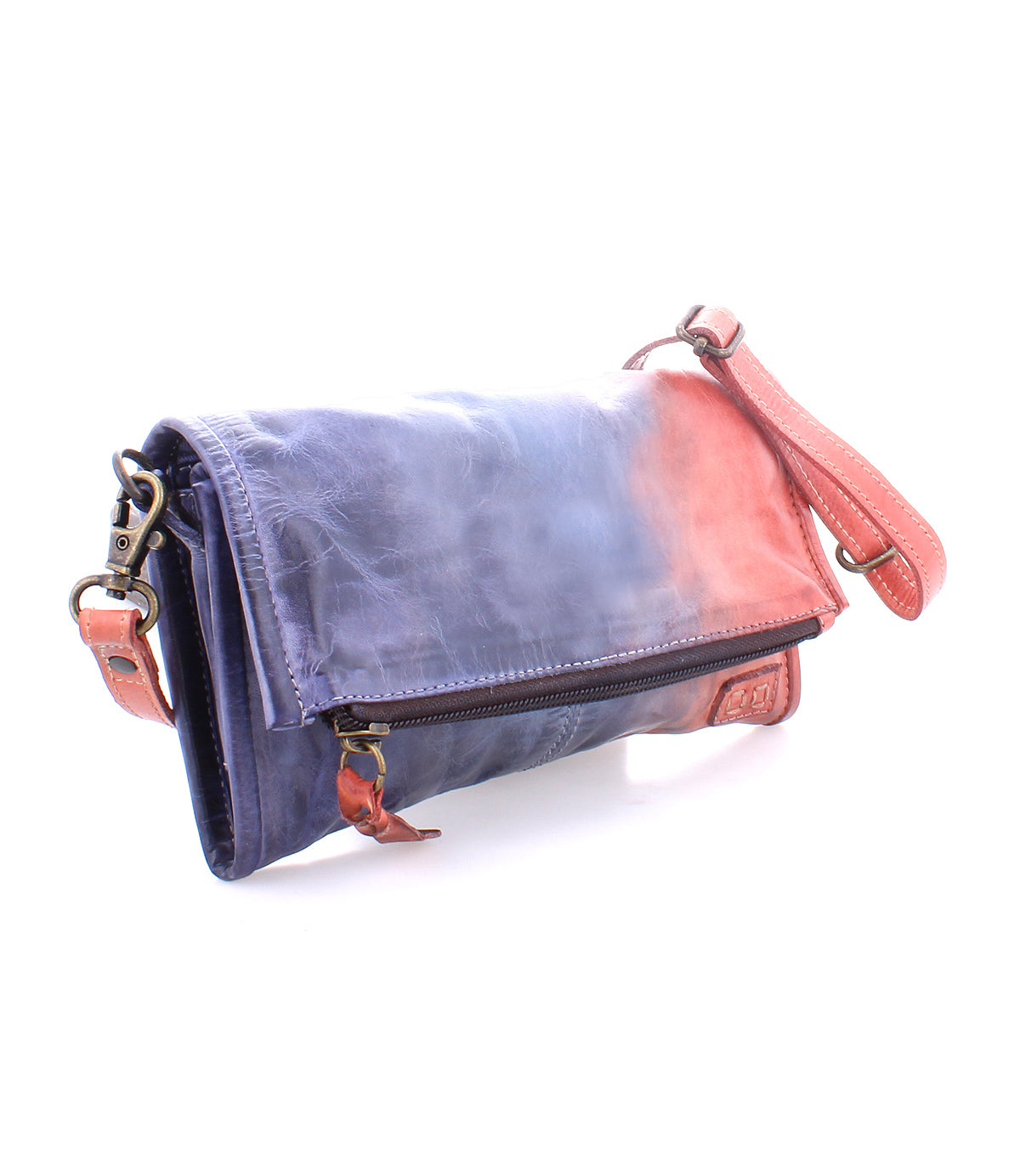A Amina crossbody clutch with a gradient blue to pink color scheme and bronze hardware, isolated on a white background.