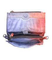 Multicolored leather wallet with multiple zippered compartments and built-in card slots, isolated on a white background - Amina wallet by Bed Stu.