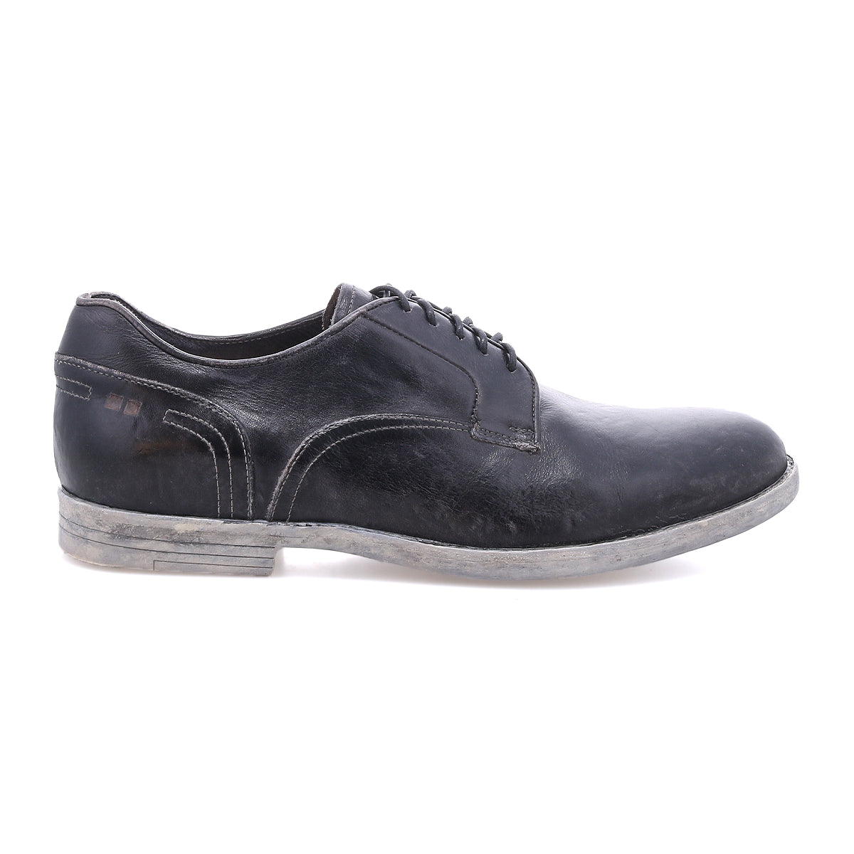 The Bed Stu Anchiano is a black distressed leather oxford shoe with visible stitching and a scuffed, flexible sole, shown in profile against a white background.