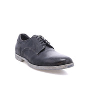 The Bed Stu Anchiano is a black leather oxford with a flexible sole and slightly worn finish, shown against a white background.