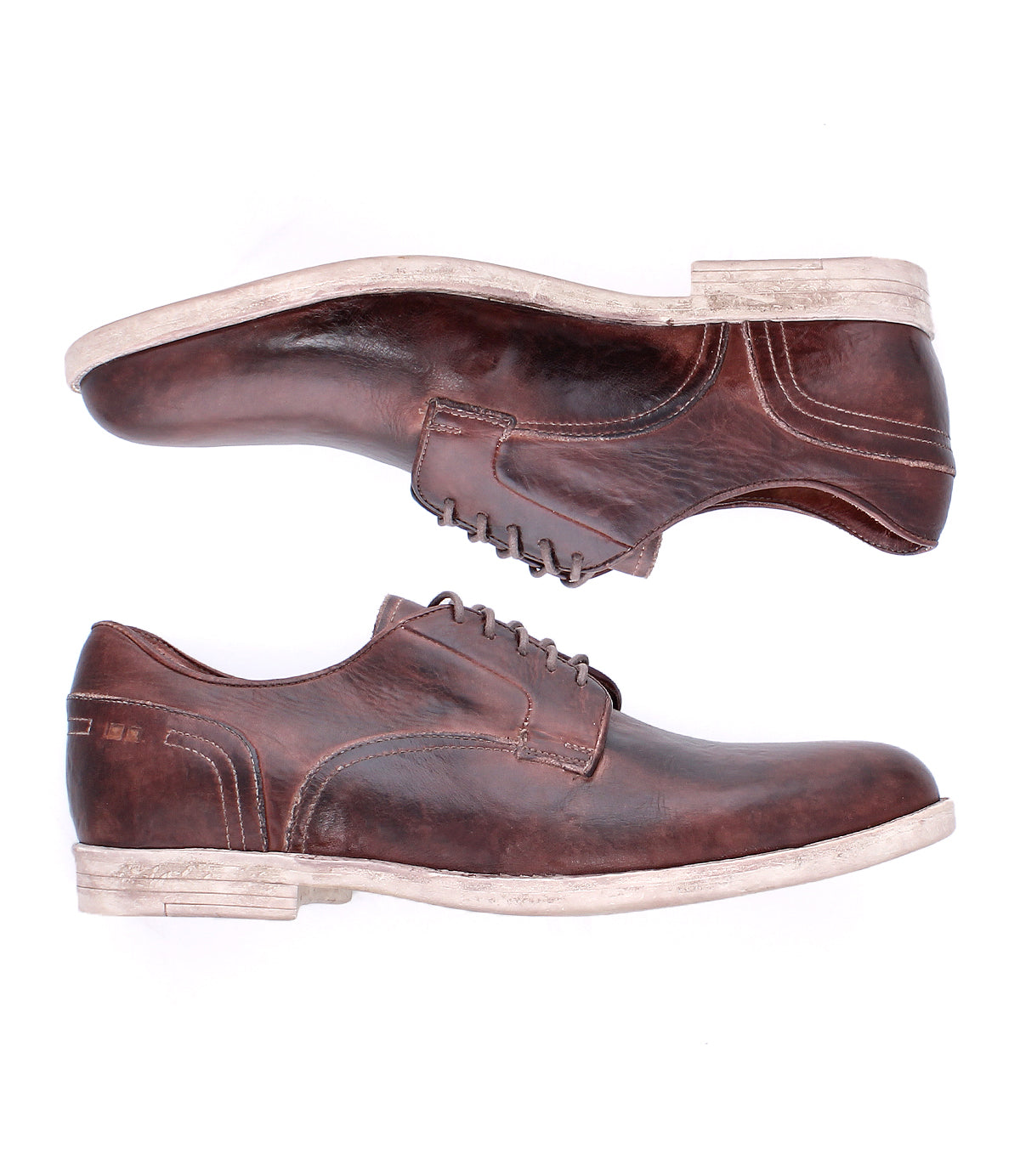 The Bed Stu Anchiano shoes are brown distressed leather oxfords with lace-up fronts and white flexible soles, displayed from the side on a white background.