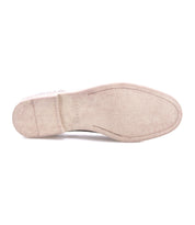 The bottom view of the Bed Stu Anchiano beige oxford shoe displays a flat, slightly textured flexible sole with visible stitching and small round indentations near the heel.