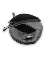 An open black leather Bed Stu Andie with multiple compartments and zippers, shown from a top angle, makes for a versatile accessory that blends practicality and style effortlessly.