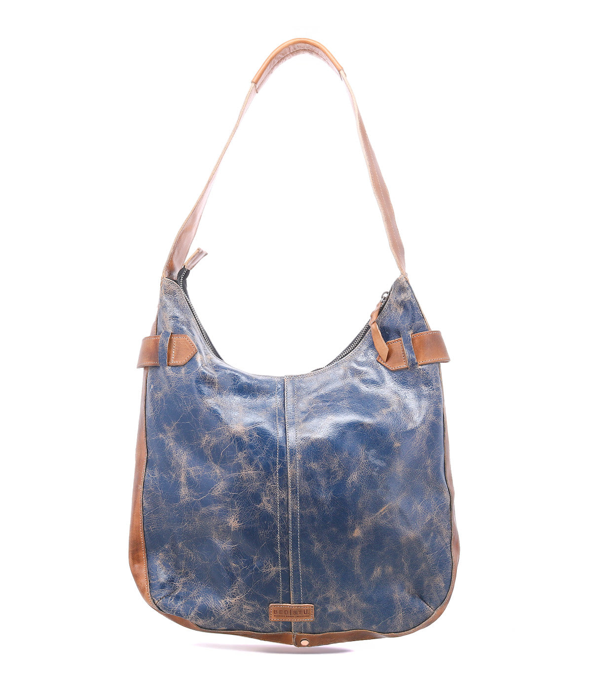 The Bed Stu Argus is a blue and brown handcrafted leather shoulder bag featuring a single wide strap, prominent stitching, oversized front pockets, and a weathered finish, shown against a white background.