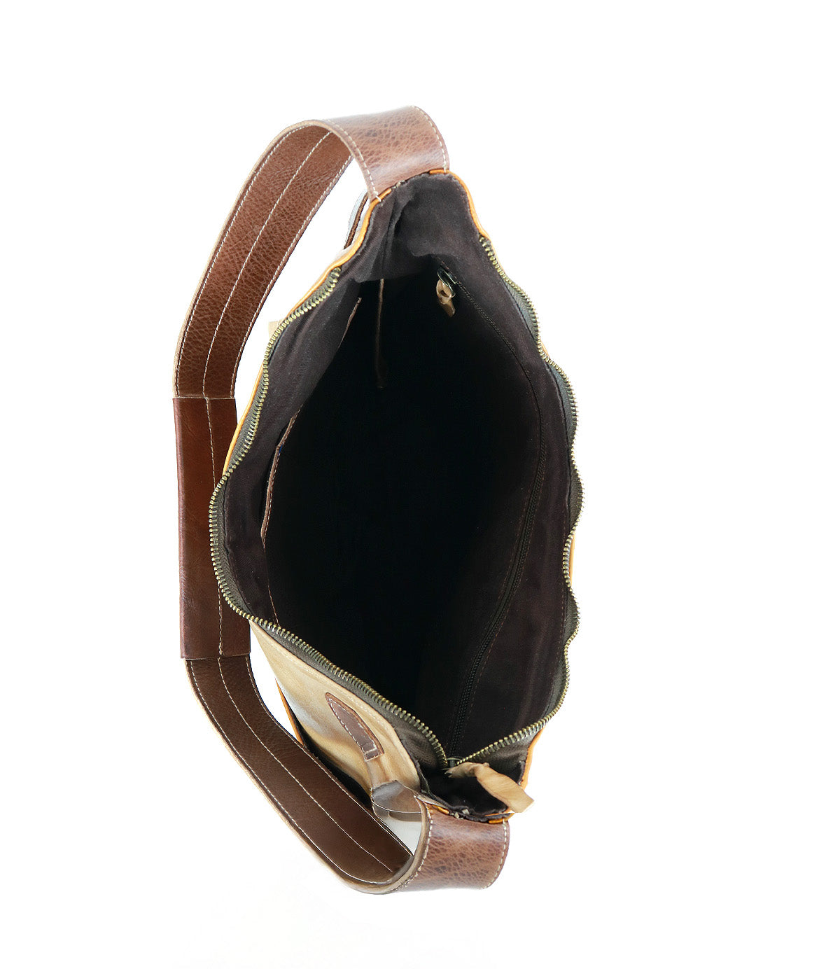 Top view of the Bed Stu Argus, a handcrafted brown leather shoulder bag with a zippered main compartment, visible inner lining, and oversized front pockets for stylish functionality.