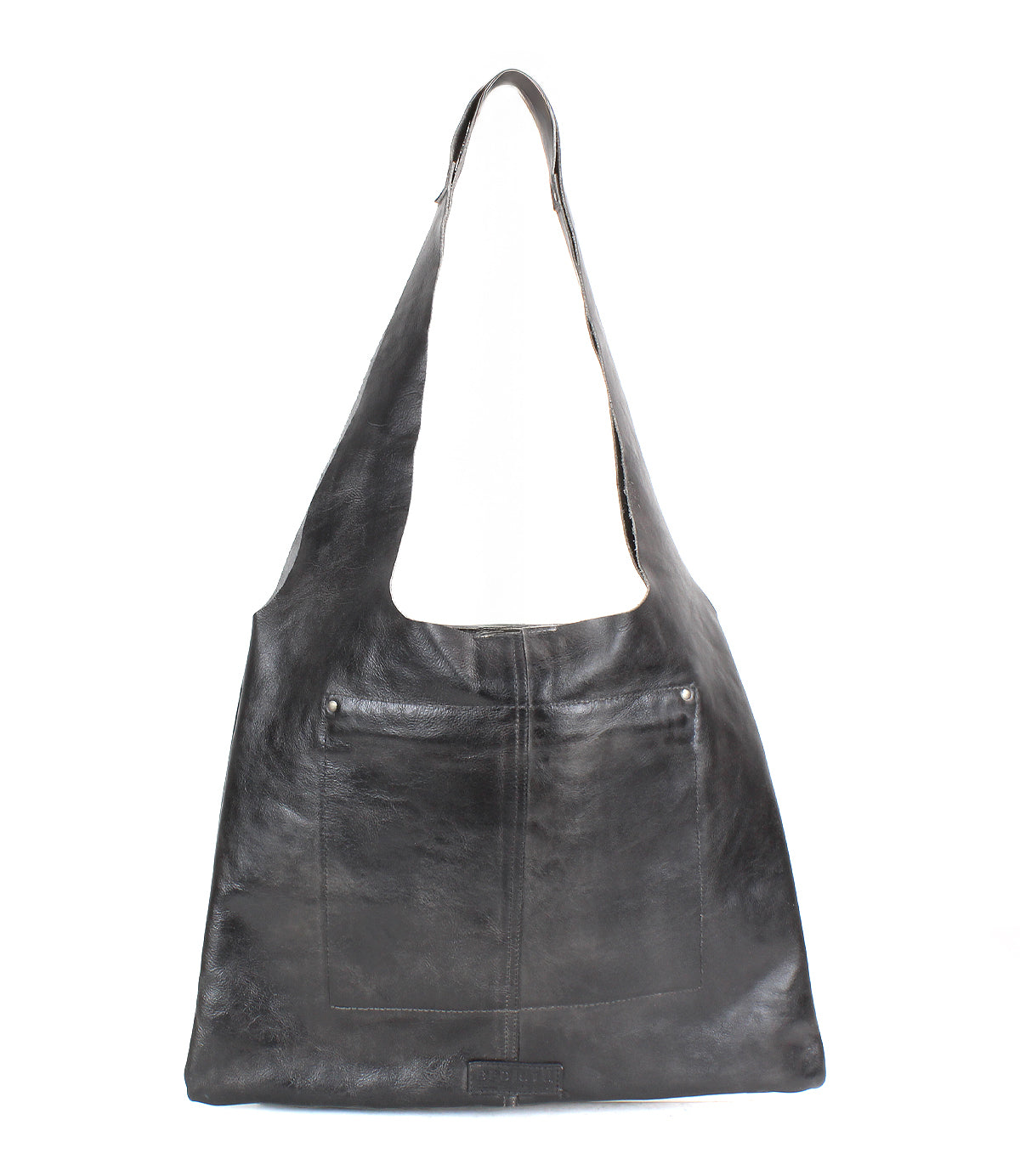 The Bed Stu Ariel II is a large black leather shoulder bag with a front pocket and wide strap, showcasing minimalism with a spacious compartment. It is displayed against a plain white background.