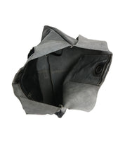 Open view of the Ariel II tote by Bed Stu, featuring its empty gray leather form with visible seams and pockets. The spacious main compartment highlights the bag's roomy interior, balancing style with a lightweight design.