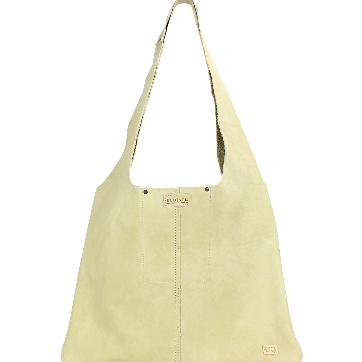 The Ariel II by Bed Stu is a lightweight beige shoulder bag with a wide strap and a visible logo tag. This minimalist tote offers a simple aesthetic, perfect for any occasion.