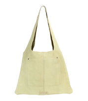 The Ariel II by Bed Stu is a beige leather minimalist tote bag with a wide strap and two front pockets, featuring a lightweight design, set against a plain white background.