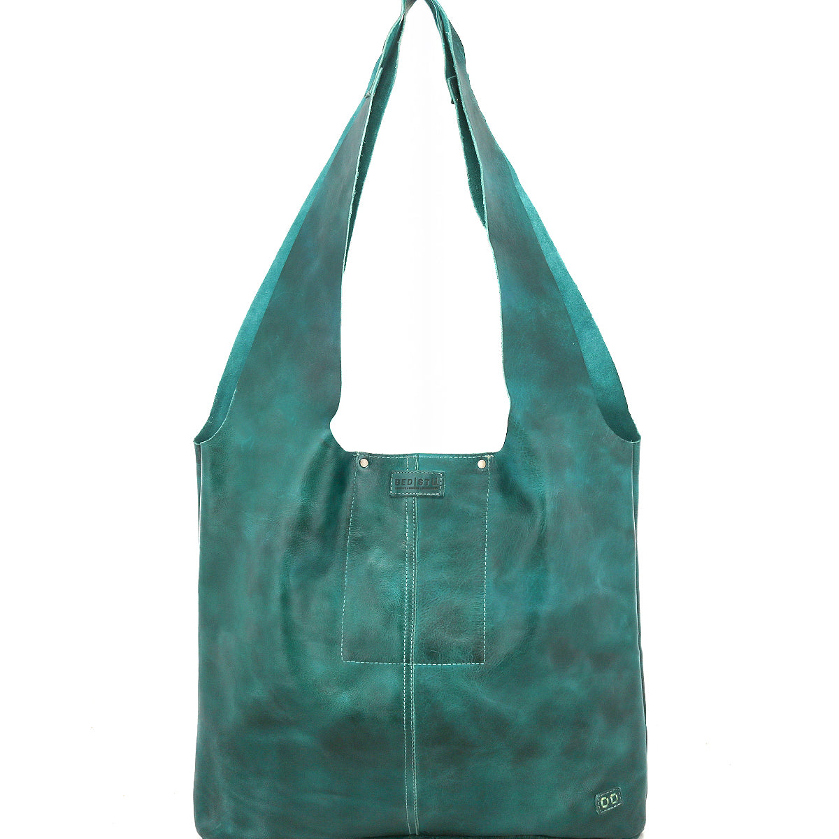 The Ariel Max by Bed Stu is a teal artisanal bag with a front pocket and wide straps, crafted from hand-finished leather and displayed upright against a white background.
