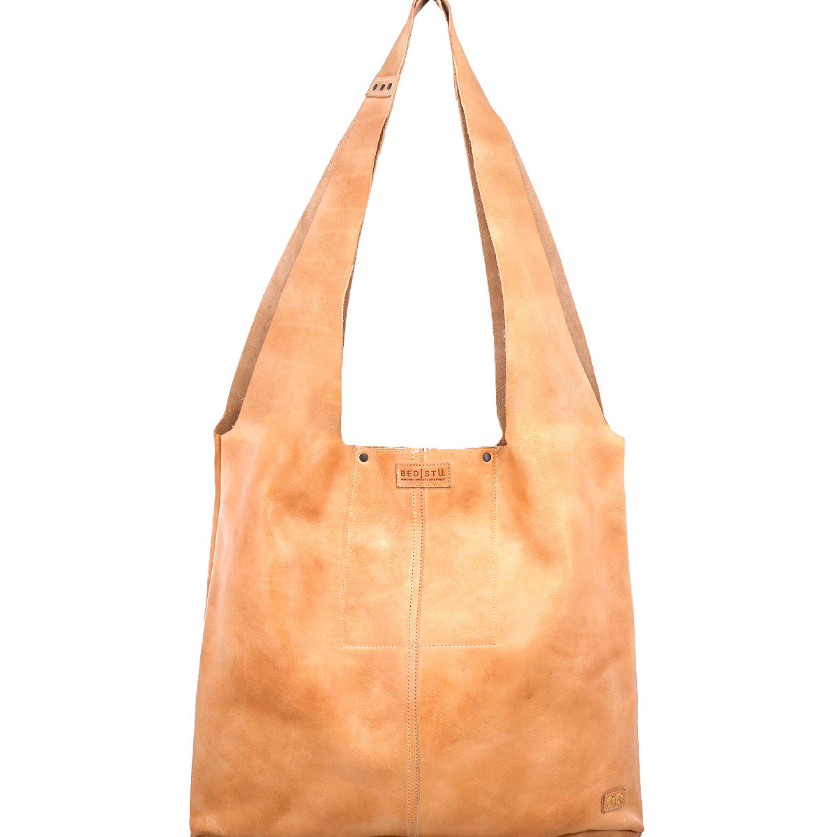 The Bed Stu Ariel Max is a tan hand-finished leather shoulder bag with a wide strap and visible stitching, shown against a white background.