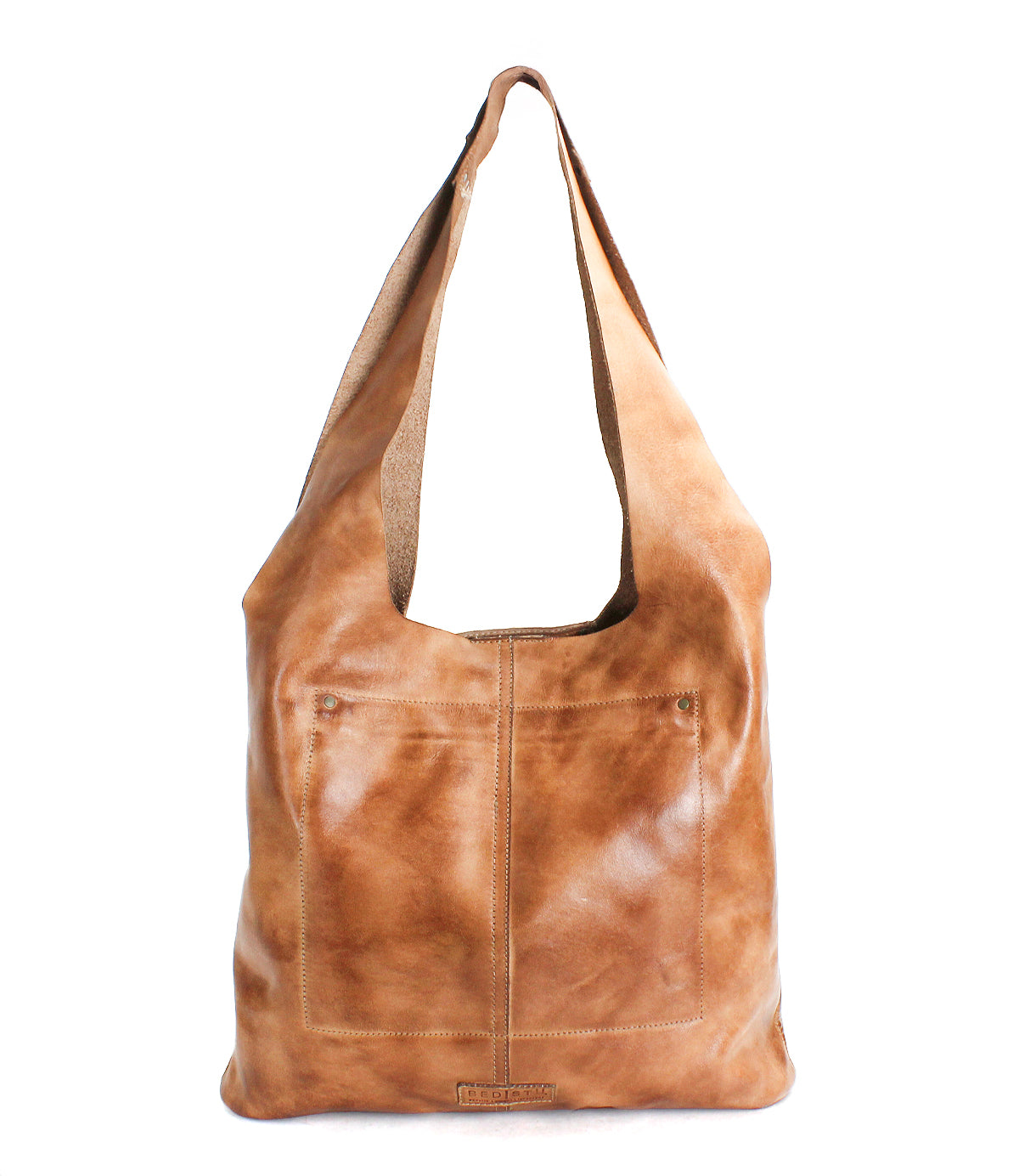 The Bed Stu Ariel EM is a limited edition large brown leather tote bag with a wide shoulder strap and front pocket, shown on a white background. This minimalist design blends style and functionality for everyday use.