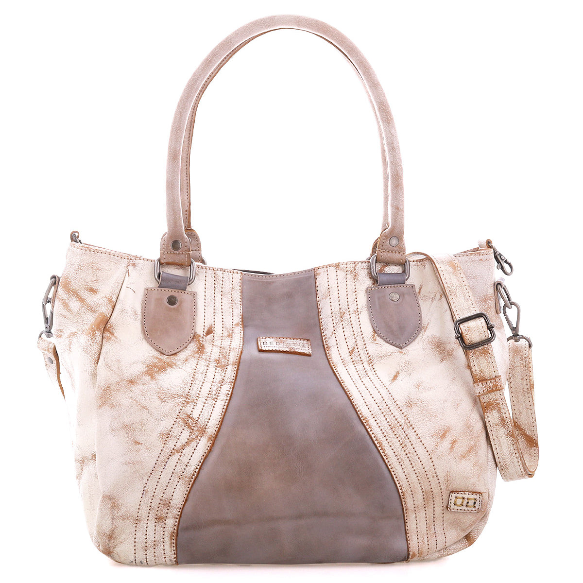 The Bed Stu Astana is a modern handbag in beige and taupe leather with double handles, decorative stitching, metal hardware accents, and a detachable shoulder strap—ideal for everyday use.