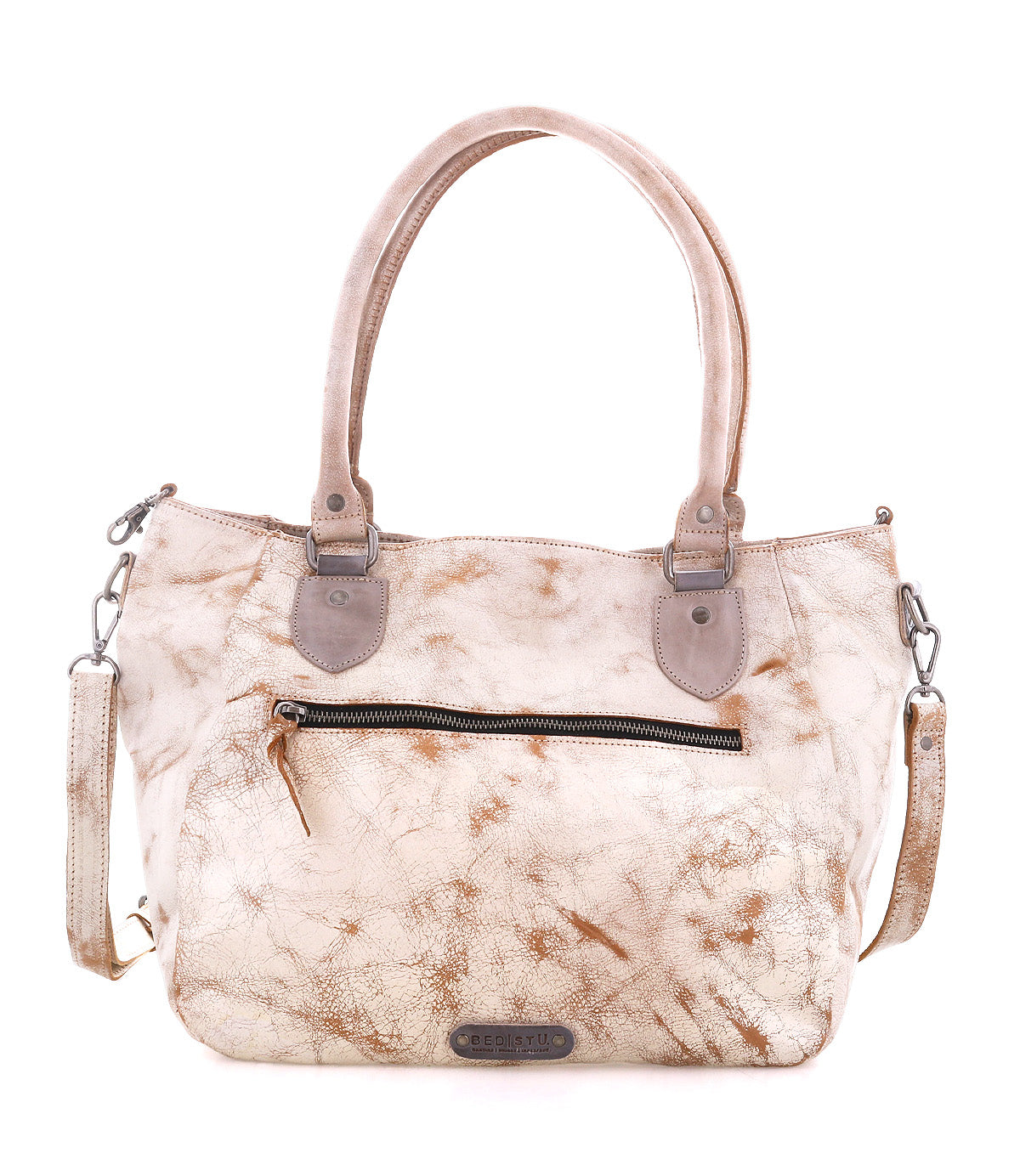 The Bed Stu Astana is a beige marbled modern handbag with two handles, a detachable shoulder strap, and a front zippered pocket, styled like a vintage bowling bag and shown on a white background.