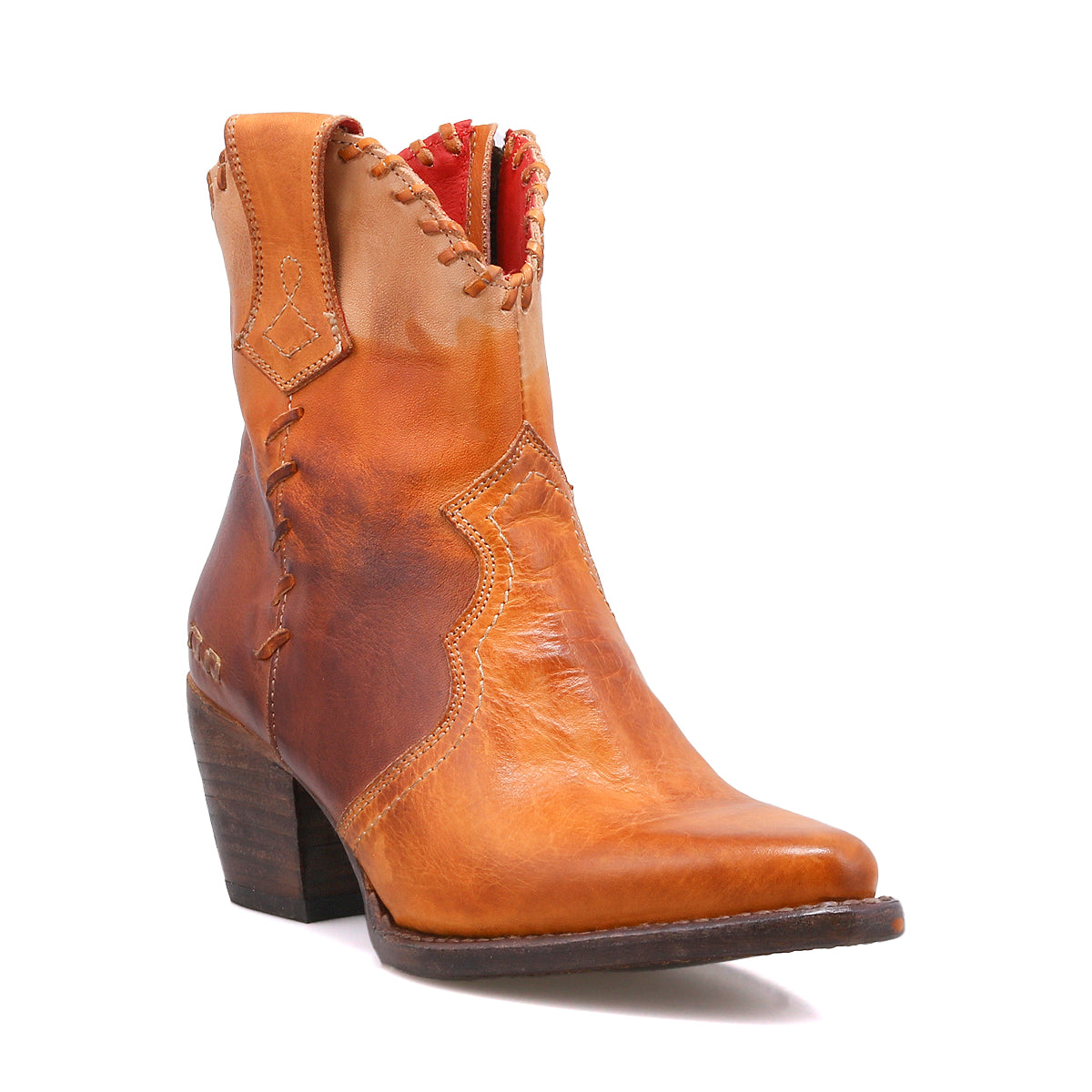 Bed|Stü Baila II tan leather Western-inspired ankle boot with a pointed toe, stacked heel, and red interior lining.