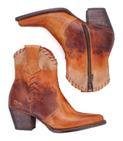 Bed|Stü Baila II brown leather Western-inspired ankle boots with a pointed toe, side zipper, and decorative lacing.