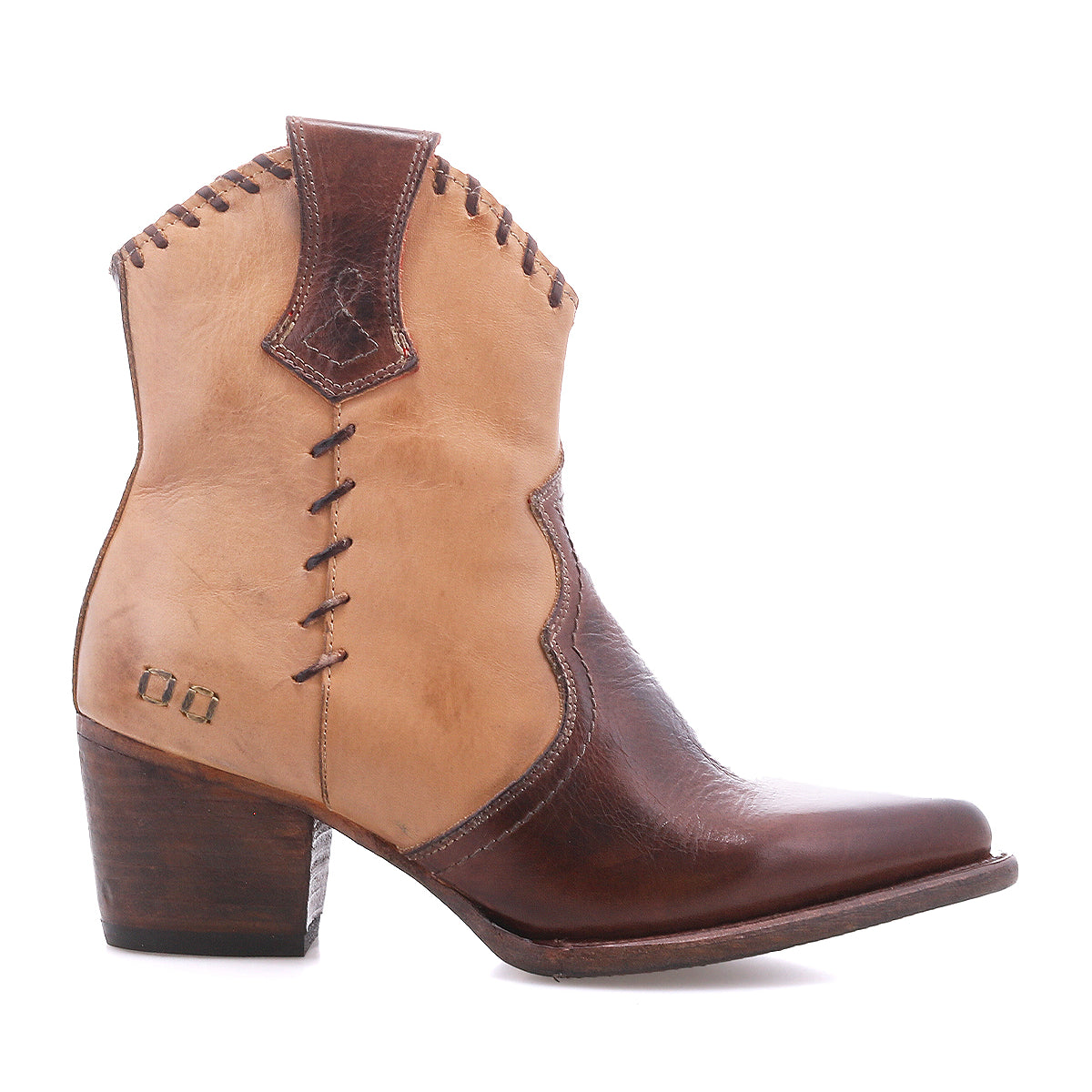 The Baila II by Bed|Stü is a two-tone brown leather cowboy boot with artisanal construction, featuring decorative stitching, a wooden heel, and a pointed toe. This Western-inspired boot is shown in a side view against a white background.