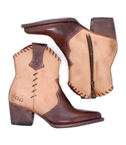 Baila II by Bed|Stü is a pair of two-tone leather cowboy boots displayed on a white background, featuring a pointed toe, brown heels, decorative stitching, side zipper, and scalloped edging. These Western-inspired boots exemplify artisanal construction for lasting style and durability.