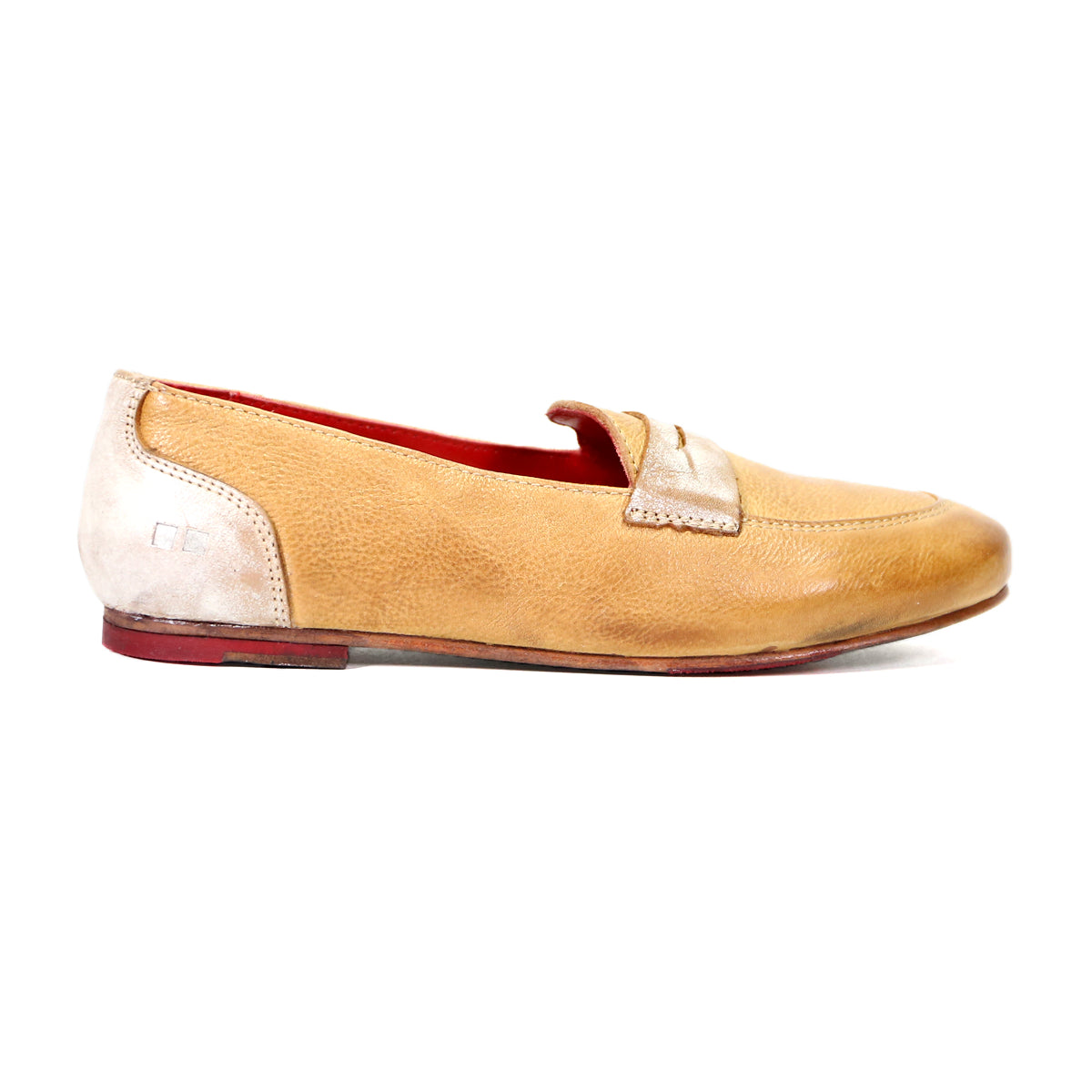 A single Bed Stu beige leather penny loafer with a red interior and a small metal emblem on the side, displayed against a white background.
