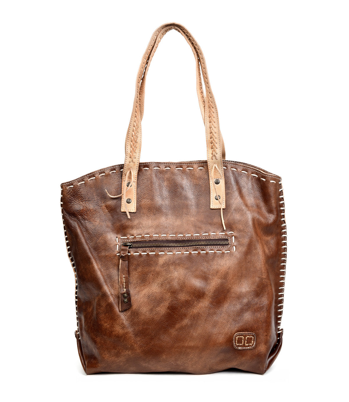 The Bed Stu Barra is a brown leather tote with tan handles, front zipper pocket, contrast stitching, and a small embossed logo at the lower right. Handmade with eco-friendly finishes for timeless, sustainable style.
