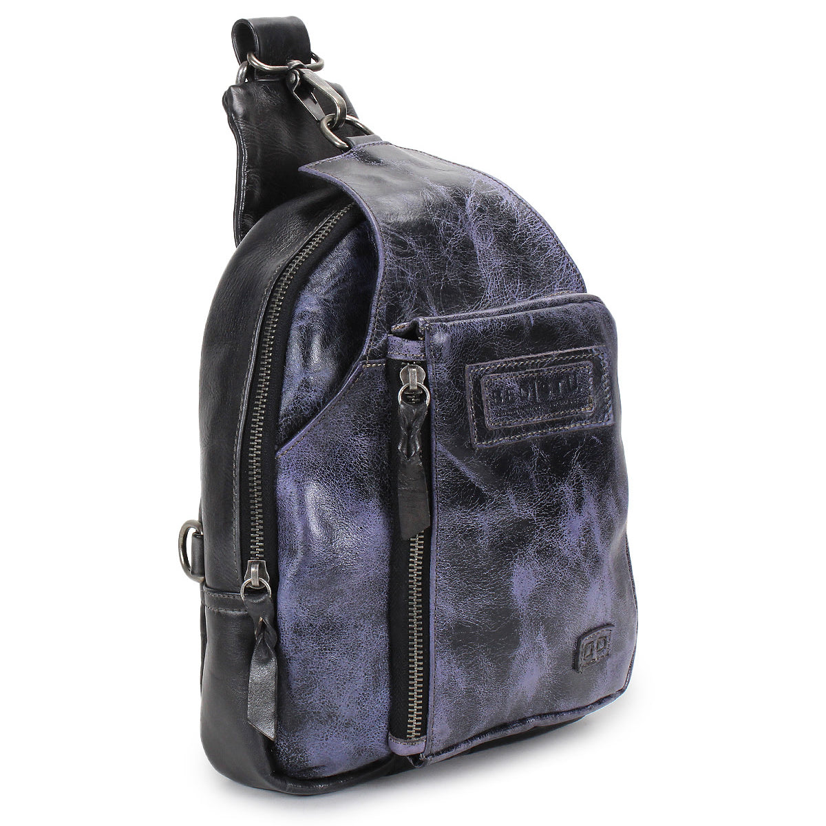 The Bed Stu Beau is a small black and purple leather sling backpack featuring a front zipper pocket and top handle, combining hands-free convenience with stylish storage for your daily essentials.