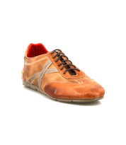 The Bed Stu Bingo II is a brown leather sneaker with beige accents, black laces, and a red inner lining, made using Goodyear reverse construction and set on an XL EXTRALIGHT outsole, shown against a white background.