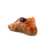 The Bed Stu Bingo II is a brown leather sneaker with dark laces, seen from the back-left on a white background, featuring a durable XL EXTRALIGHT outsole for all-day comfort.