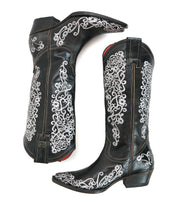 Black cowboy boots with white intricate patterns on a white background