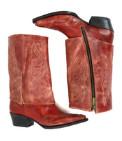 The Bed Stu Blind boots are red distressed leather cowboy boots with decorative stitching, side zippers, and a classic Western silhouette, shown in both side and top views.