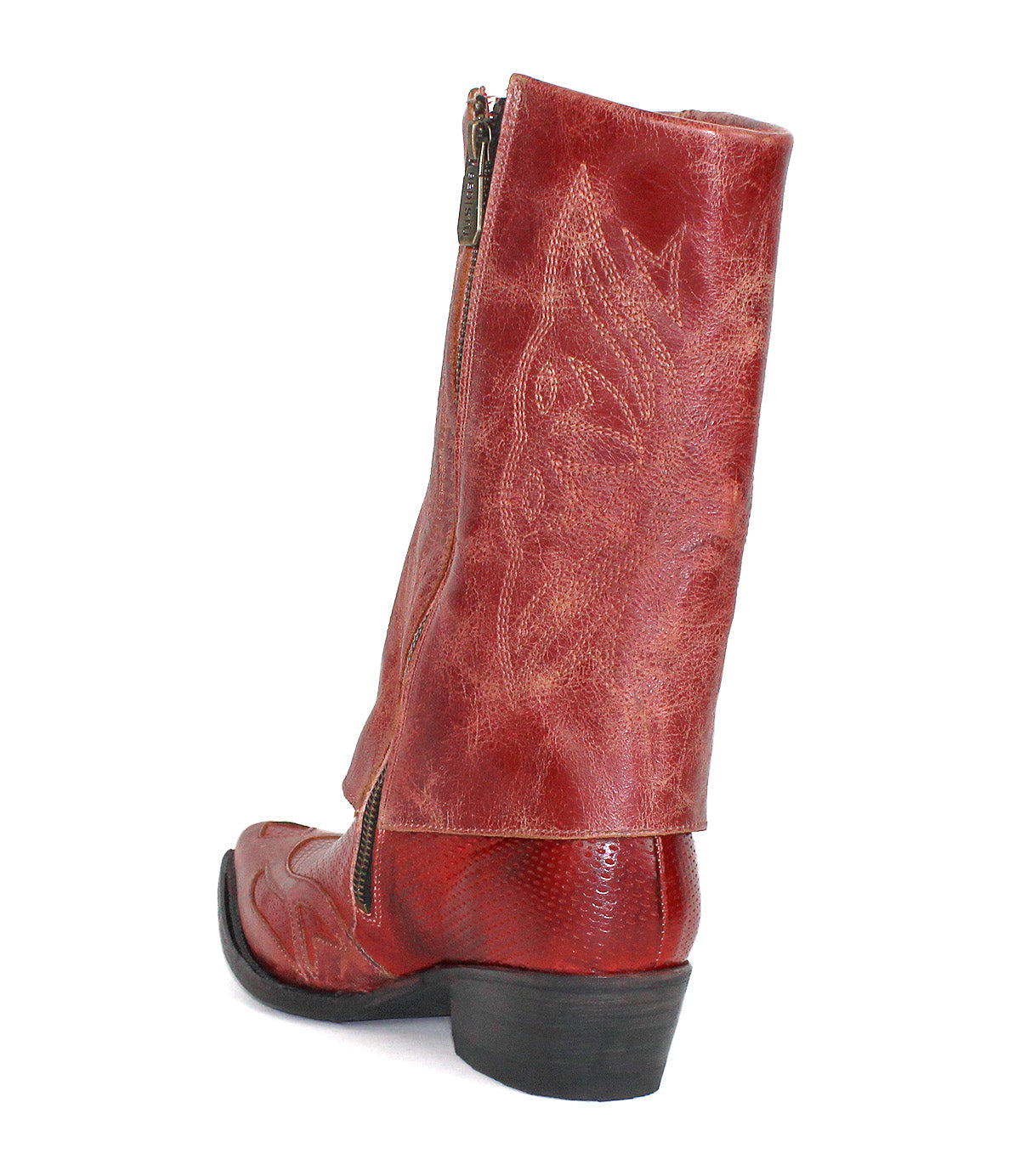 The Bed Stu Blind is a red distressed leather mid-calf boot featuring decorative stitching, a side zipper, and a low black heel, shown from an angle.