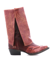 The Bed Stu Blind is a single red distressed leather boot with decorative stitching and a worn look, shown from the side on a white background, showcasing its classic Western silhouette.