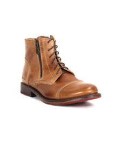 The Bed Stu Bonnie II is a brown leather combat ankle boot featuring a cap toe, lace-up front, side zipper, low heel, and slightly worn look, shown on a white background.