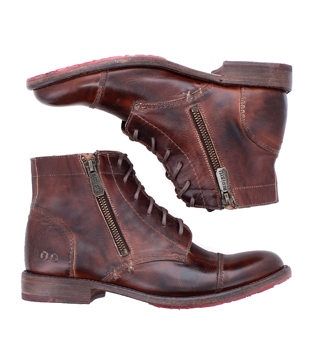 The Bed Stu Bonnie II boots are brown leather combat ankle boots with cap toe detailing, zippers, and visible stitching, shown from the side on a white background.