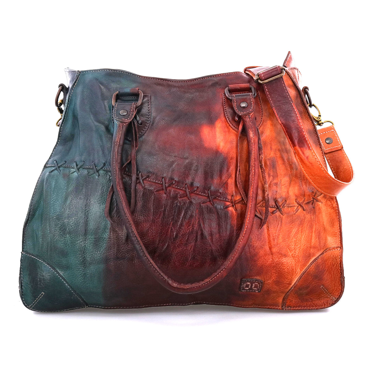 The Bruna by Bed Stu is a spacious leather crossbody bag featuring double handles, a shoulder strap, artisanal stitching, and a multicolored gradient in green, brown, and orange tones.