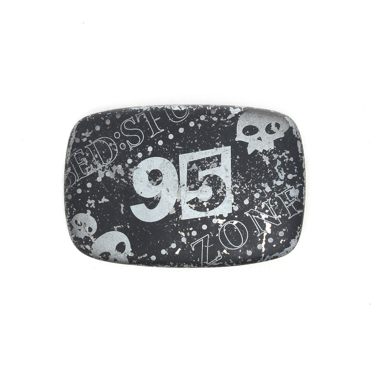 The Bed Stu 95 Buckle is a rectangular, black belt buckle with a distressed finish, featuring the number "95" and skull graphics for an edgy look.