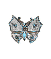 The Bed Stu Butterfly Bead Buckle features a silver finish with turquoise beads and dotted wing patterns, making it a standout western accessory.