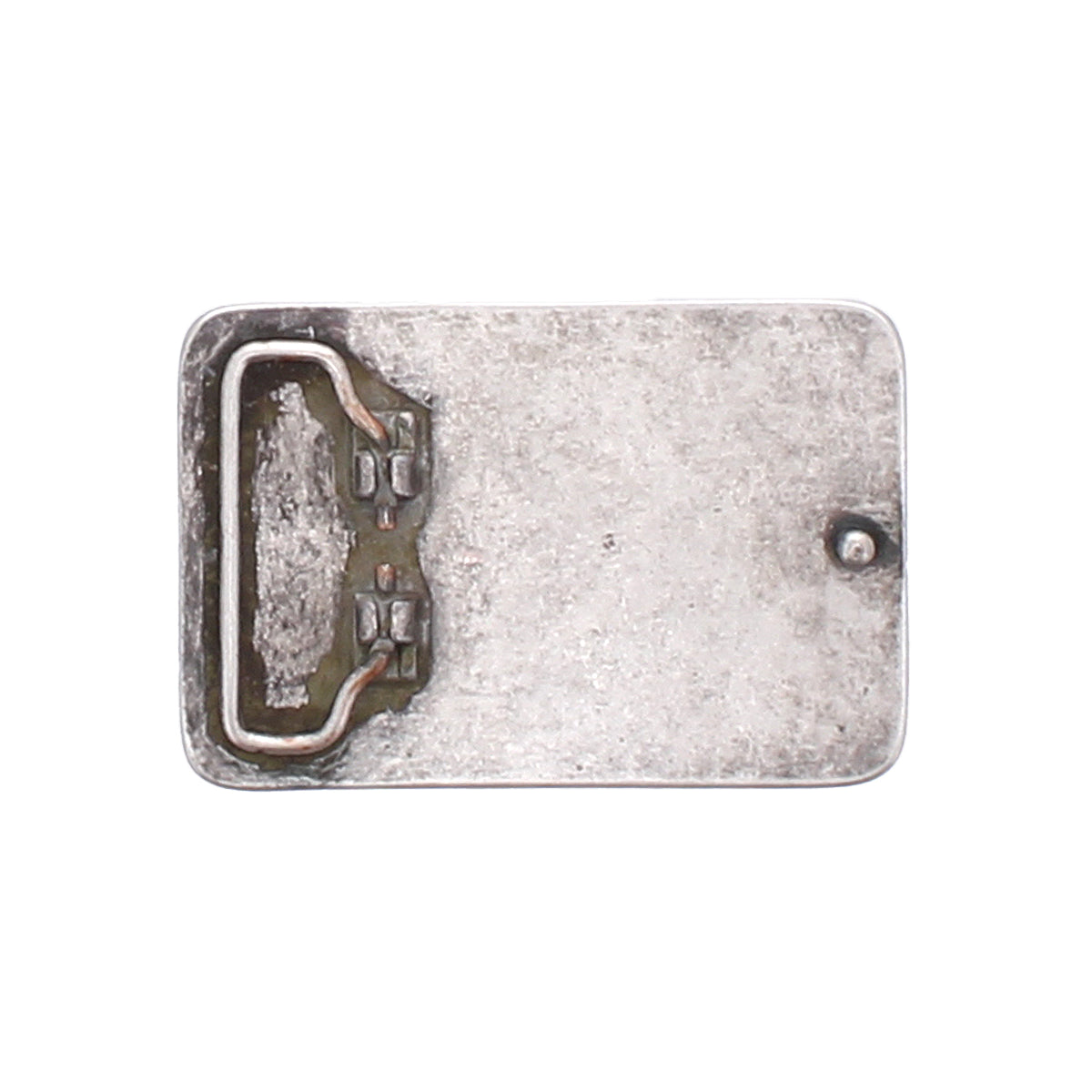 The Bed Stu Metal Cross Buckle features a rectangular vintage silver design with a raised border, small round protrusion on the right, and a metal hinge or clasp on the left side.