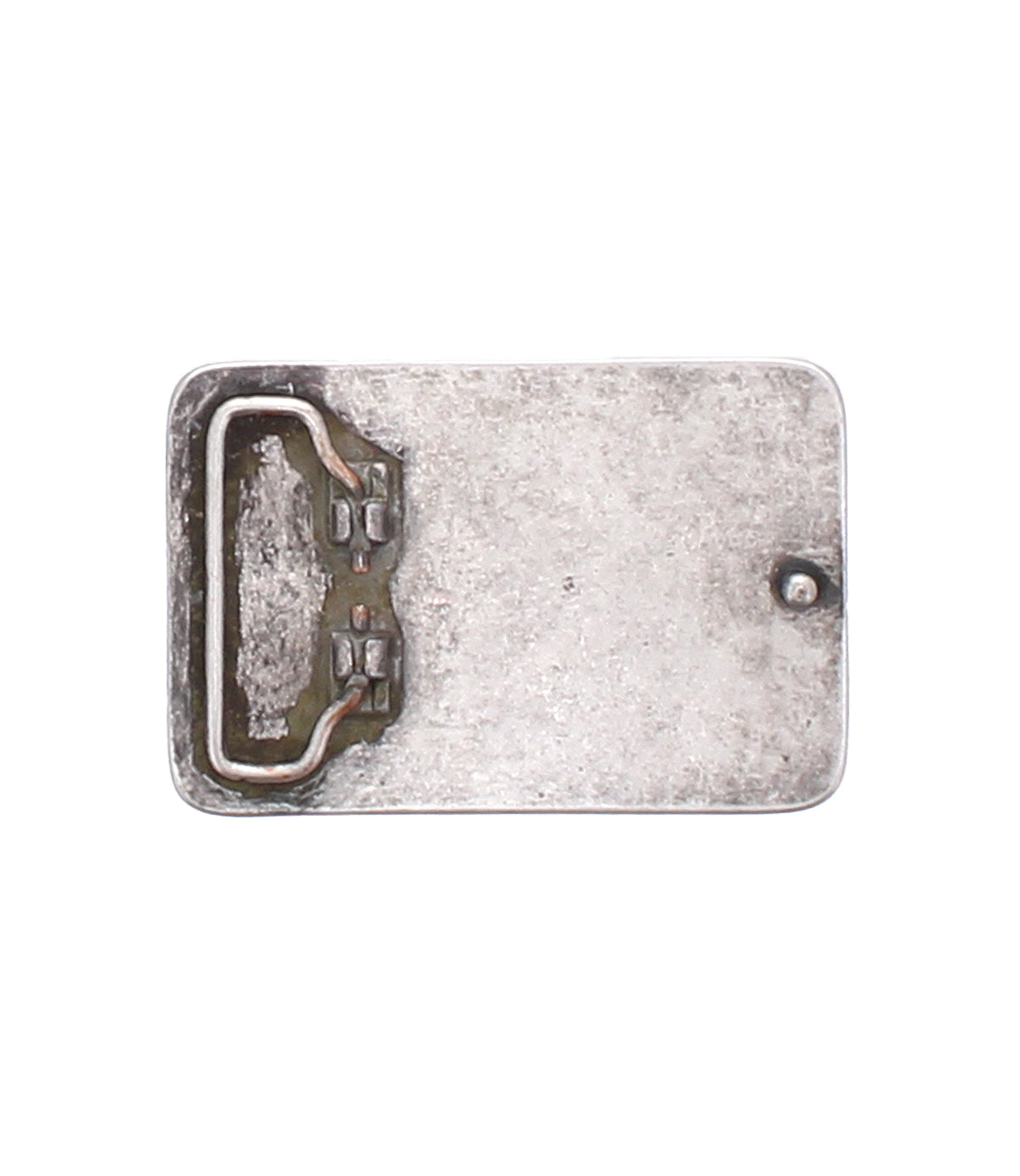 The Bed Stu Metal Cross Buckle features a rectangular vintage silver design with a raised border, small round protrusion on the right, and a metal hinge or clasp on the left side.