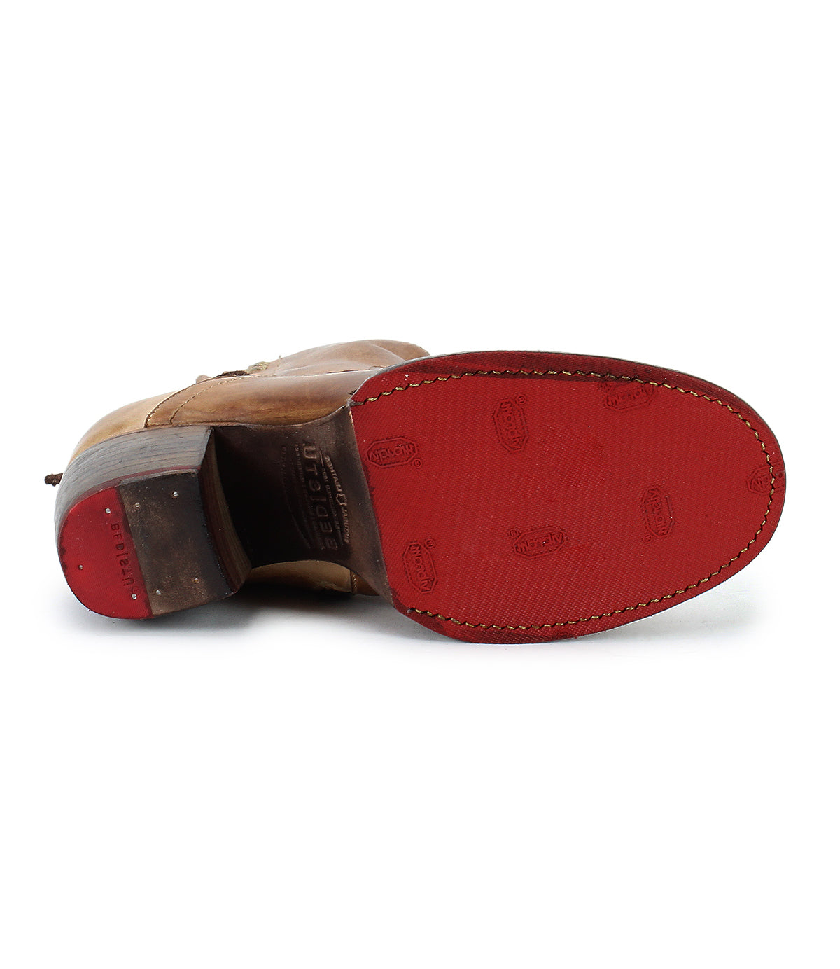 The Bed Stu Cable is a brown leather dress shoe with Western flair, shown from the bottom with a red sole, visible stitching, and small embossed logos.