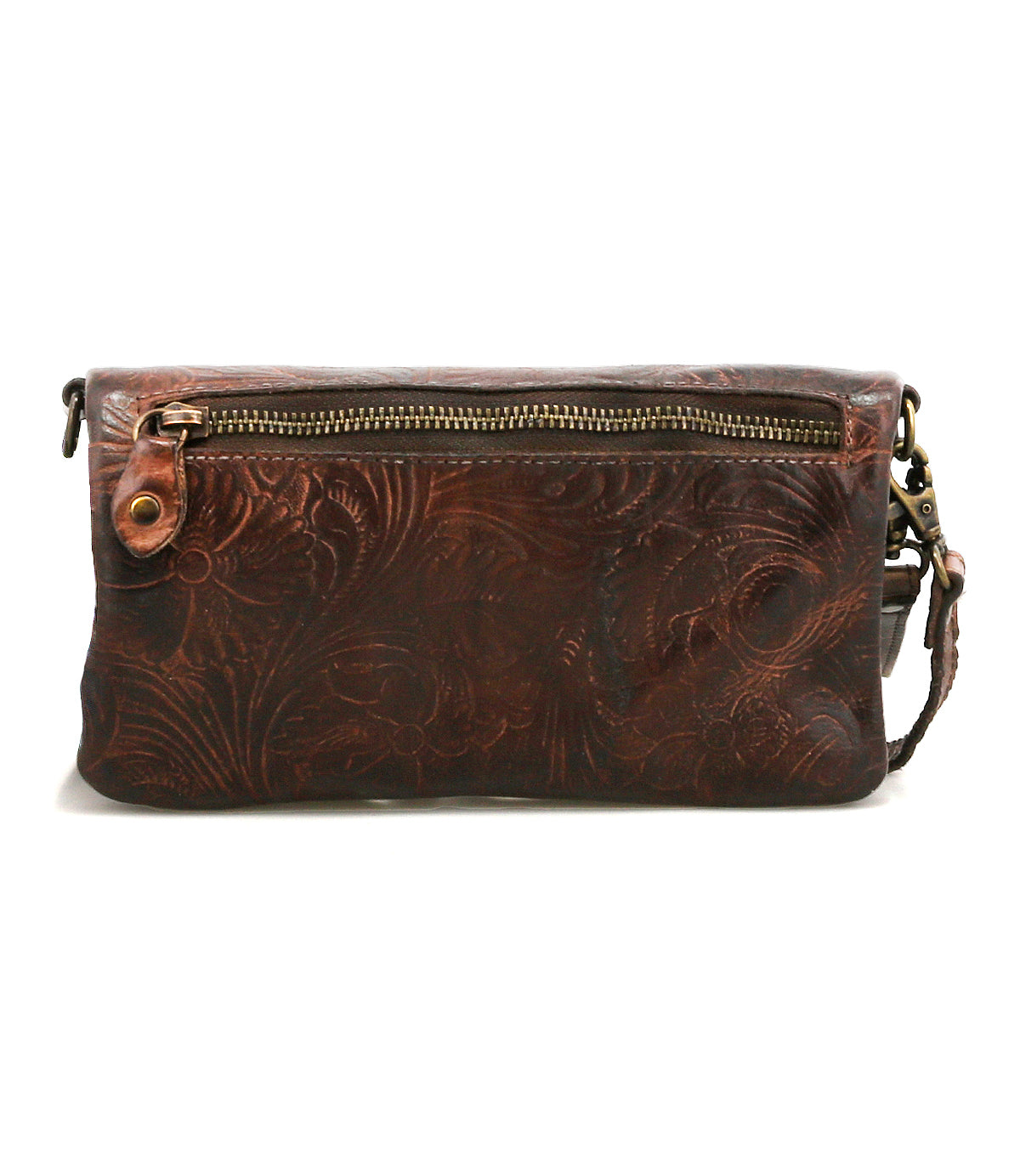 The Cadence EM by Bed Stu is a brown leather clutch with embossed floral patterns, a top zipper closure, and a detachable wrist strap—an elegant accessory for any occasion.