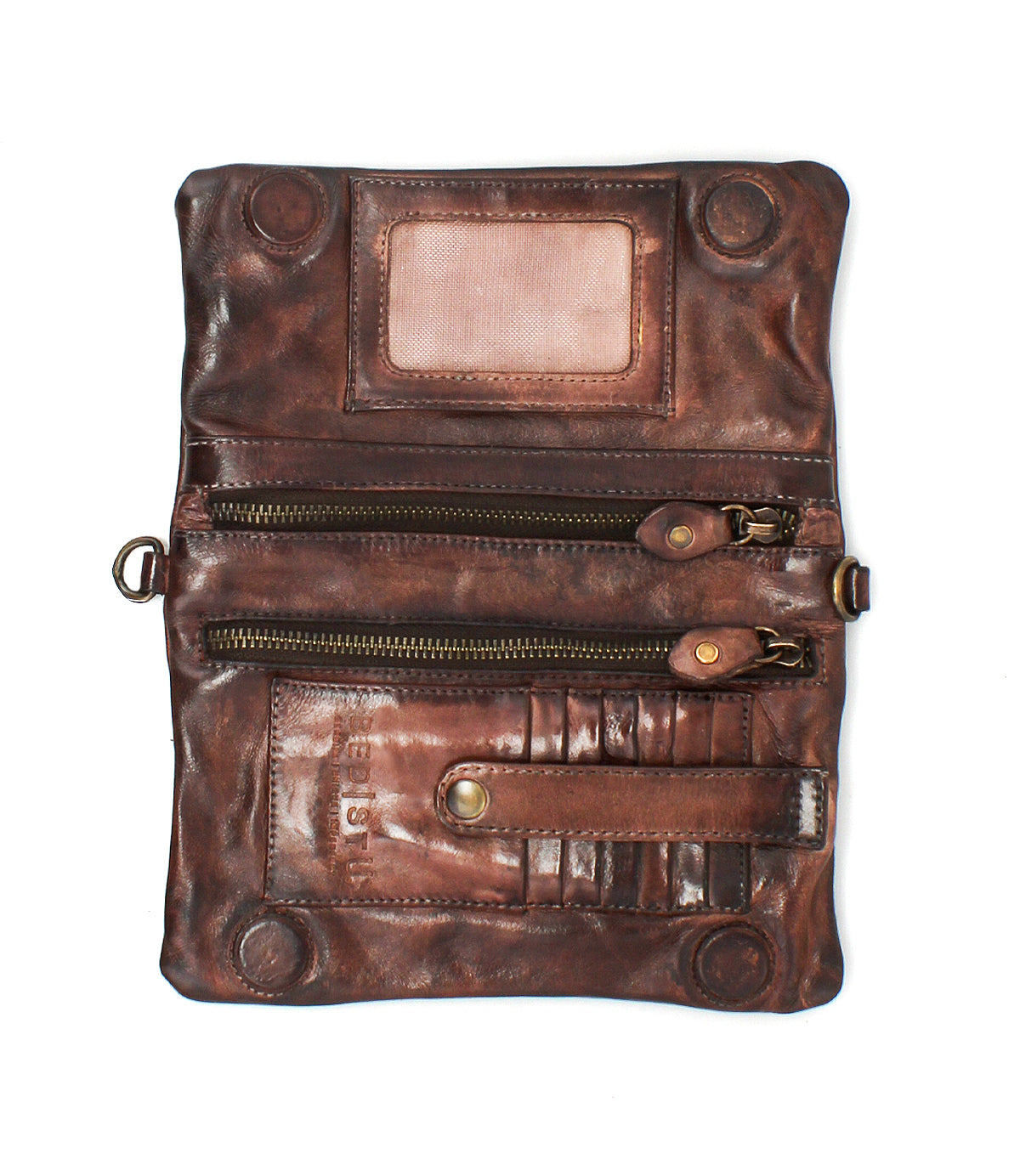 The Bed Stu Cadence EM is a brown embossed leather clutch wallet featuring multiple zippered compartments, card slots, a snap button strap, and a transparent ID window—stylish yet practical for everyday use.