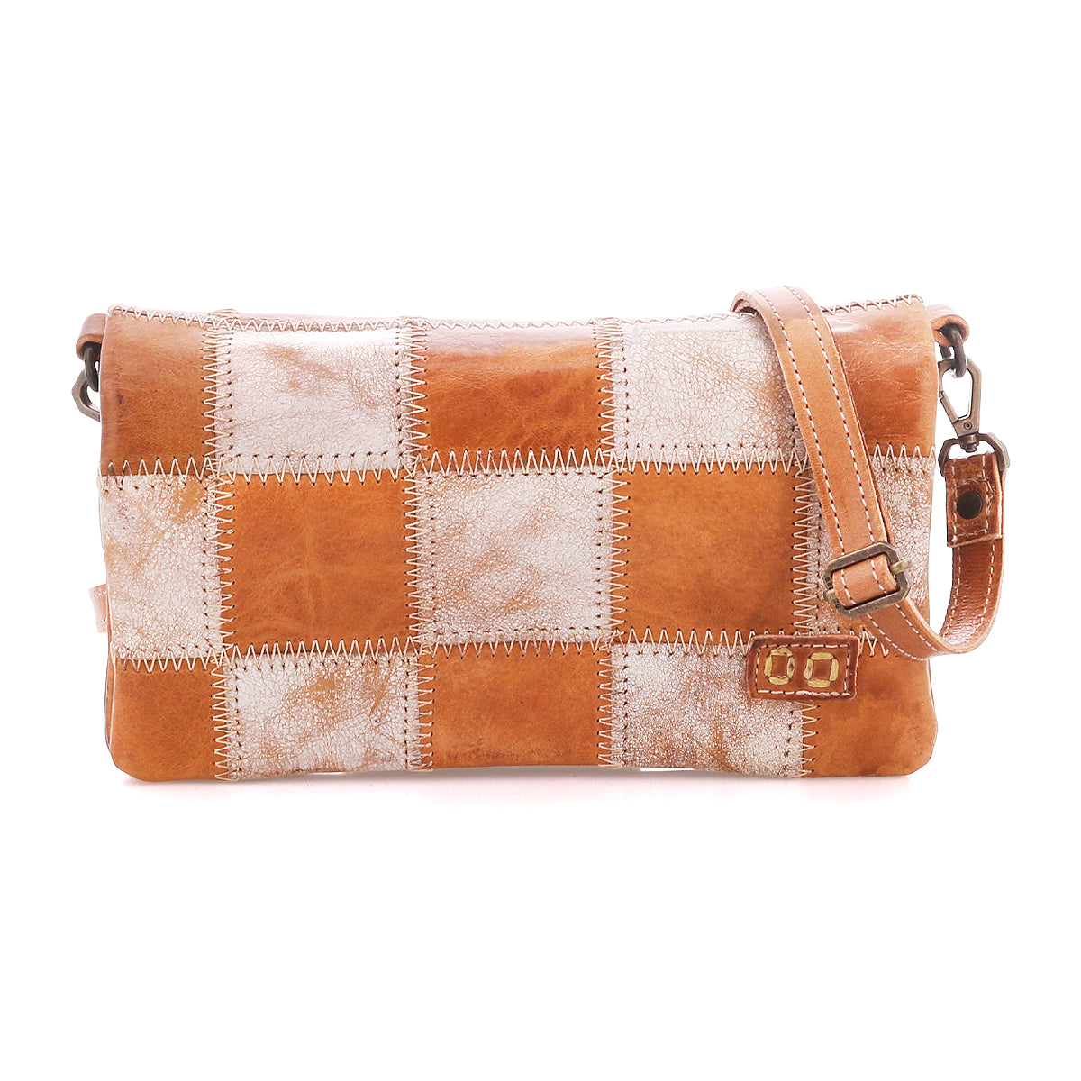 Introducing the Cadence PW by Bed|Stü—a rectangular shoulder bag adorned with a striking patchwork of brown and metallic silver squares, detailed with distinctive zigzag stitching and an adjustable strap. Crafted from premium vegetable-tanned leather, this versatile piece seamlessly transitions from a crossbody clutch to a chic accessory for any occasion, blending timeless style with modern functionality.