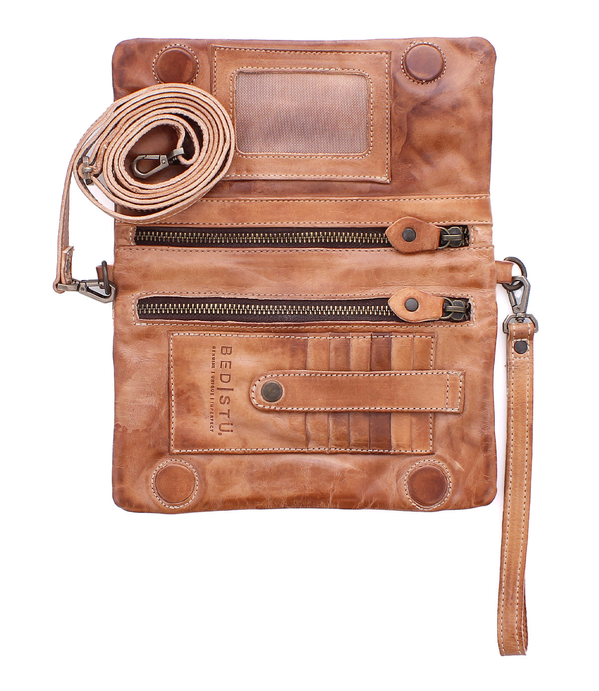 The Bed|Stü Cadence PW is a brown vegetable-tanned leather crossbody clutch featuring two zippered pockets, card slots, a clear ID window, and an adjustable strap, shown open on a white background.