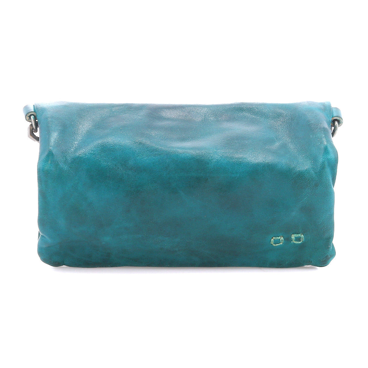 The Cadence by Bed Stu is a teal crossbody clutch made with vegetable-tanned leather, minimal stitching, and a flap closure, displayed against a white background.