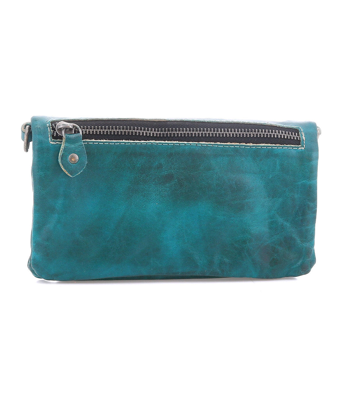 The Cadence by Bed Stu is a teal crossbody clutch made from vegetable-tanned leather, featuring a front silver zipper pocket for both style and function.