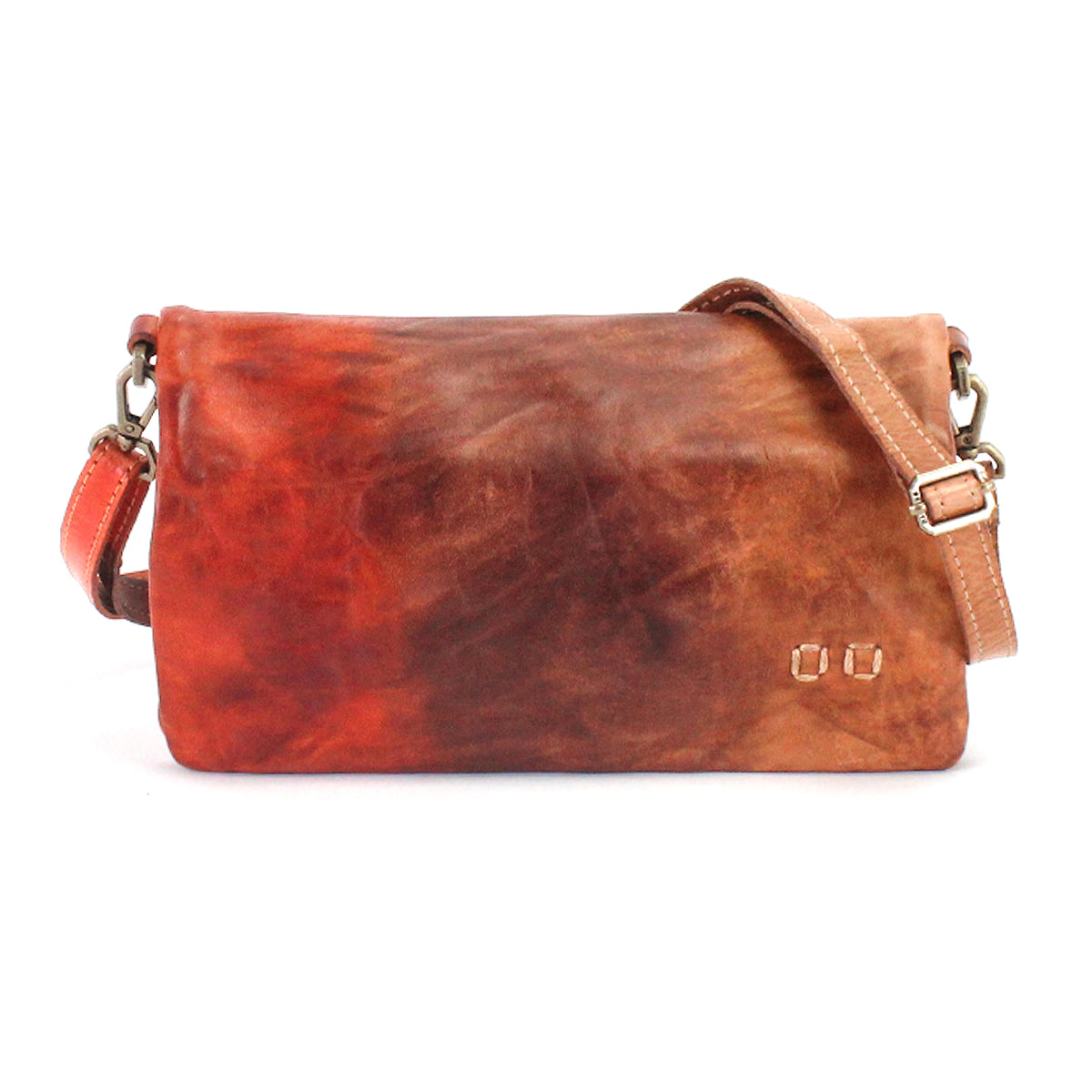 The Cadence shoulder bag by Bed|Stü features brown and reddish vegetable-tanned leather, an adjustable strap, and metal clasp hardware, shown against a white background.