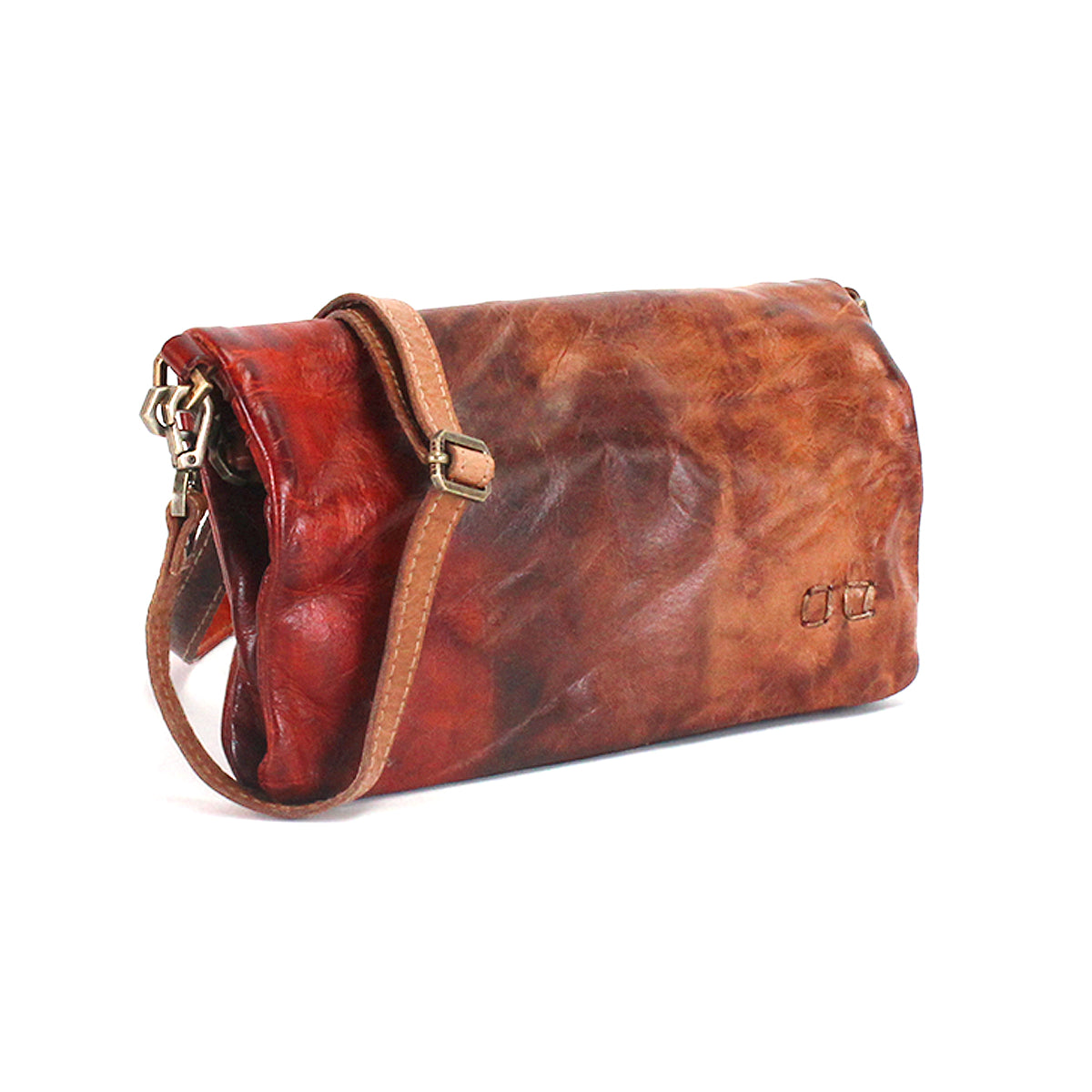Introducing Cadence by Bed|Stü: This brown leather crossbody bag features an adjustable tan strap, a subtle embossed logo, and a slightly textured, two-tone finish. Crafted from premium vegetable-tanned leather, Cadence effortlessly blends style and durability for a versatile accessory.