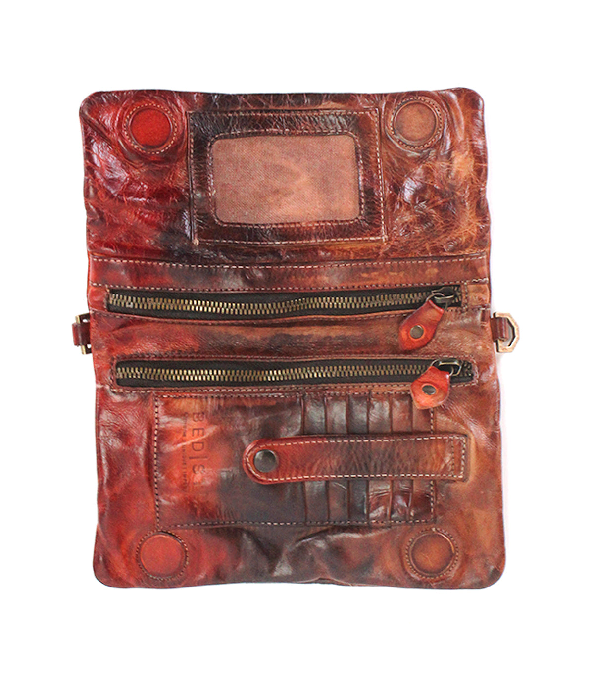 Crafted from worn vegetable-tanned leather, the Bed|Stü Cadence wallet opens to reveal two zippered pockets, multiple card slots, a clear ID window, and secure button closures.