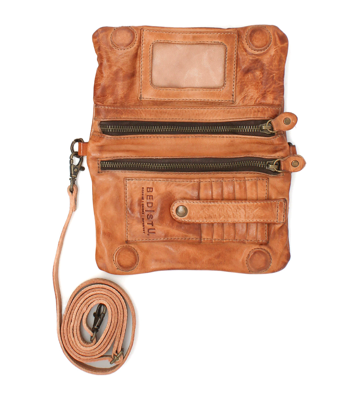 The Bed Stu Cadence EM is a brown embossed leather crossbody wallet with two zippered compartments, a snap-closure card holder, and a detachable strap, shown against a white background.